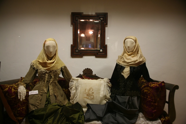 Ermioni wedding dress on display (right) from the late 19th century